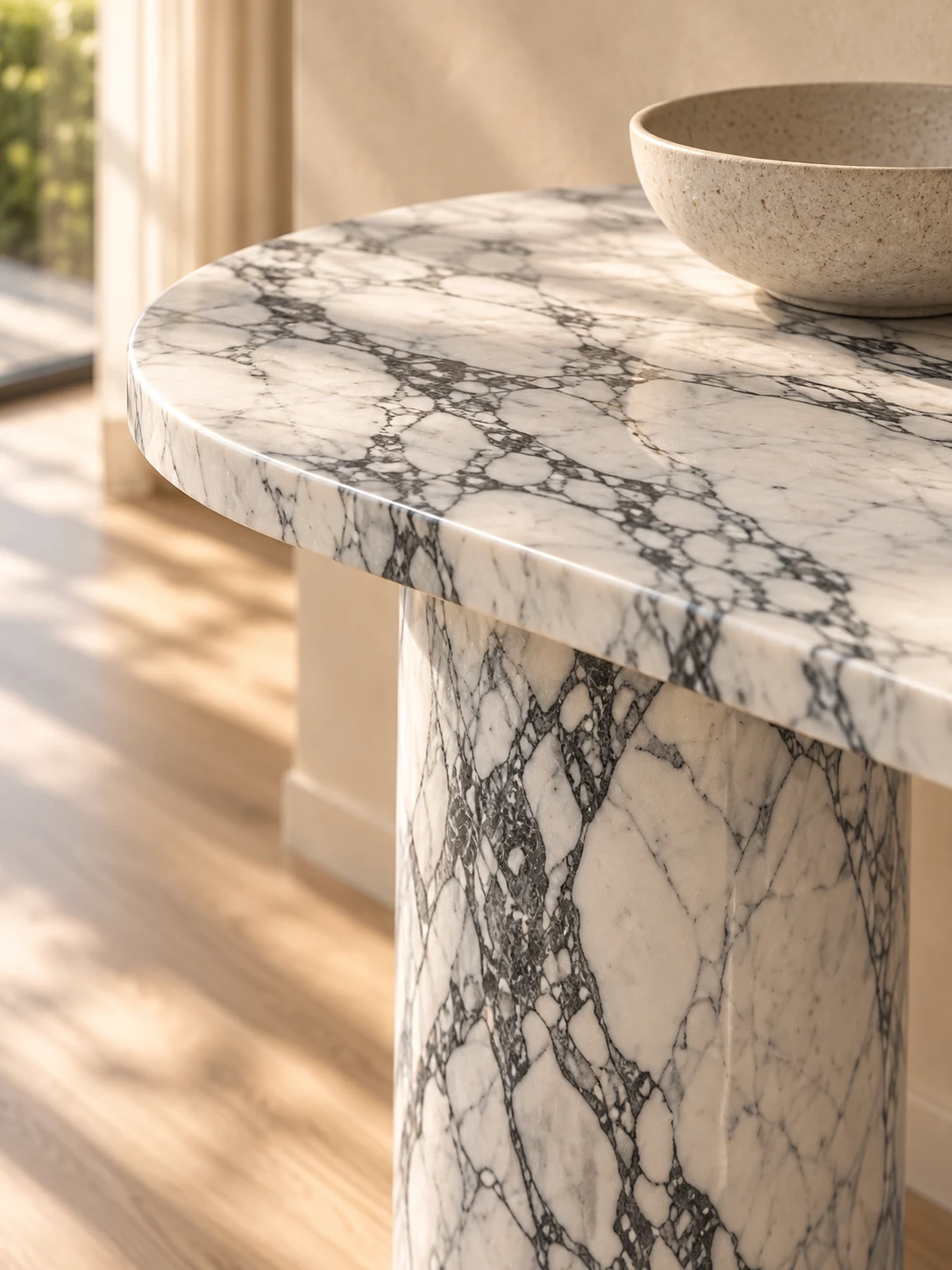 Close-up of marble veining, rounded tabletop edge, and pedestal — design visualisation